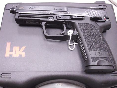 Go hold one, see if it is right for you; the base 12 round magazine makes for a largish grip. . Hk usp 9 threaded barrel